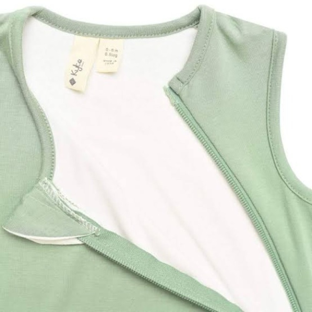 Set of 2 Kyte Baby footed sleep sacks in Matcha and Pine (discontinued colors)